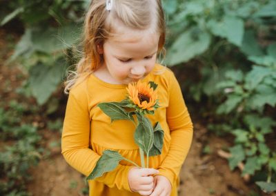 Little Girl with Sunflower