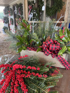 Some evergreen and cranberry sprays and table arrangements