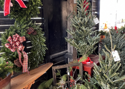 holiday wreaths, tabletop trees and box arrangements